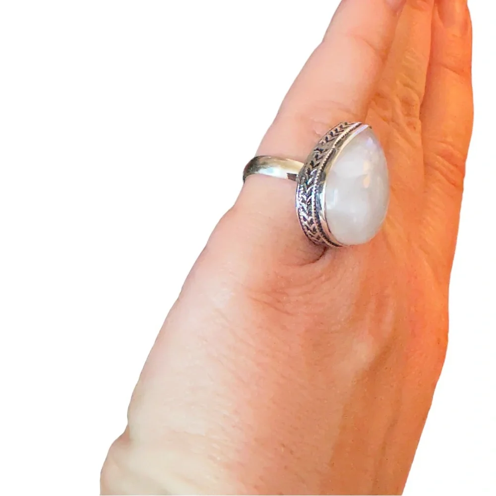 Milky white quartz teardrop stone in sterling silver setting size 6 925